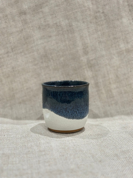 Dimple cup in blue/white glaze